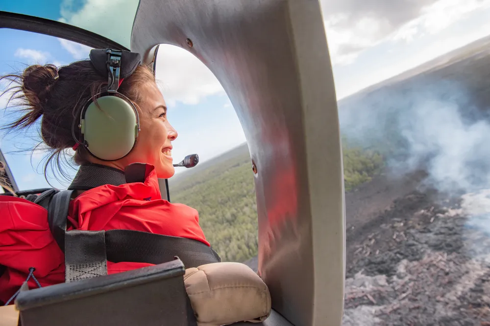 View from helicopter over Maui waterfalls and rainforest